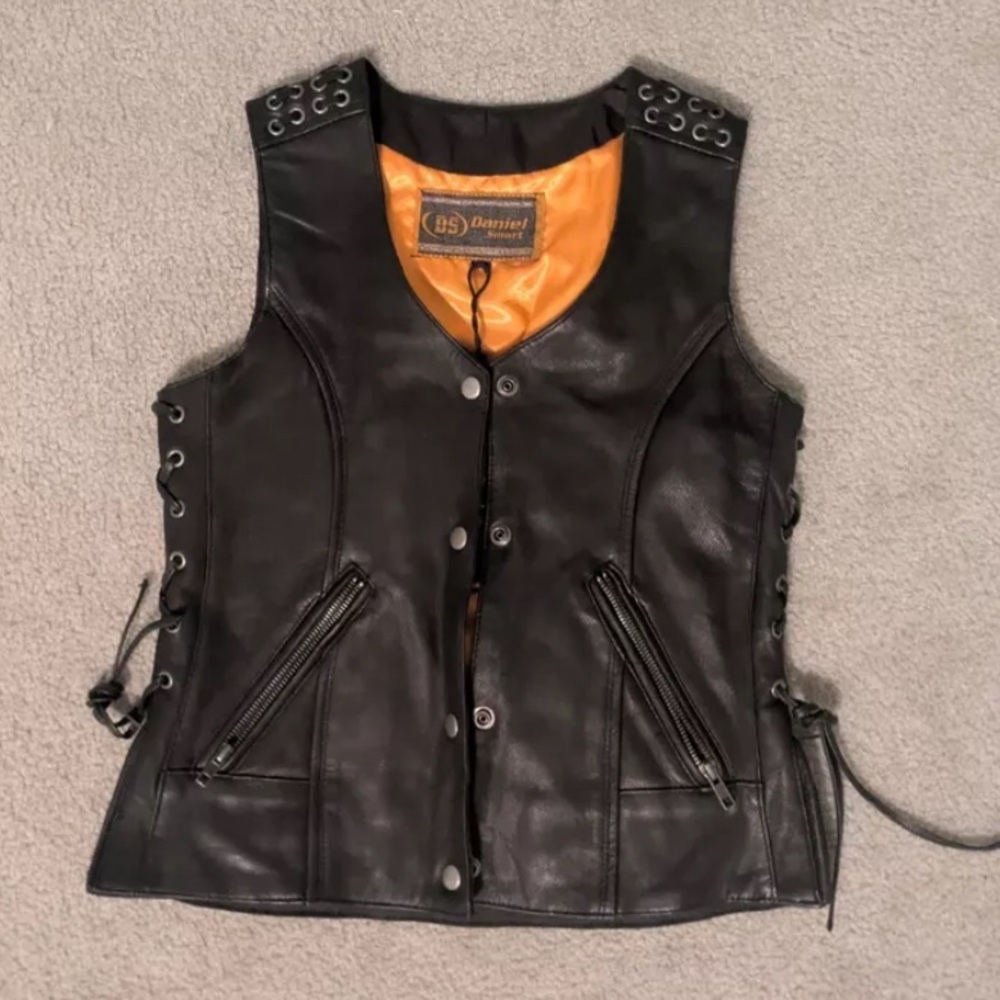 Women’s Motorcycle Black Leather Vest with fun accents and theater skulls patch